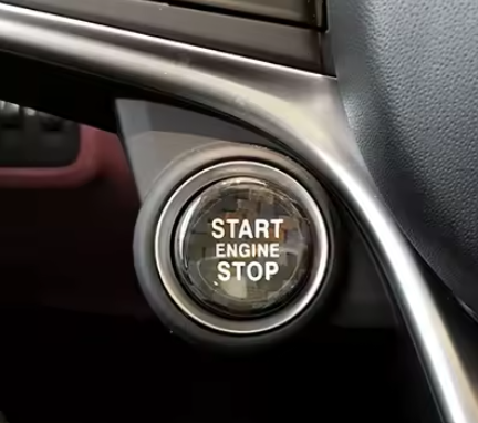 Carbon fiber START/STOP button cover